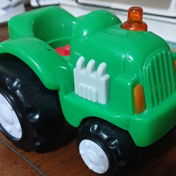 Boley Other - Green Farm Tractor Toy with Black Wheels And 3 Fresh SR44 Batteries Music Plays